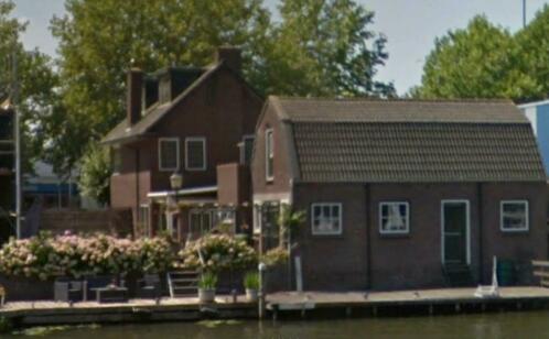 20m ligplaats in de Vecht, Maarssen incl garage en woonhuis