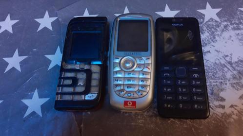 3 oude telefoons.