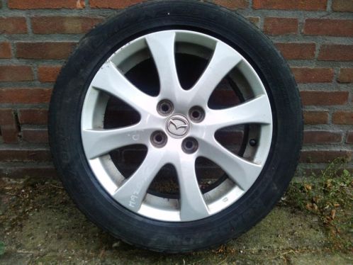 4 x 15 inch lichtmetalen velgen Mazda 323