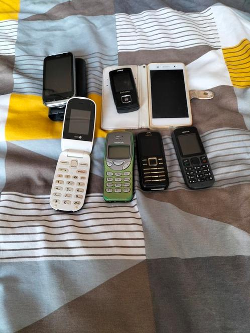 7mobiele telefoons geen opladers erbij j