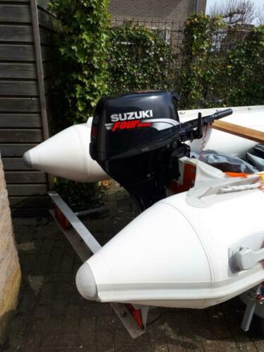 9.9 pk suzuki 4 takt met kniktrailer suzumar rubberboot 390