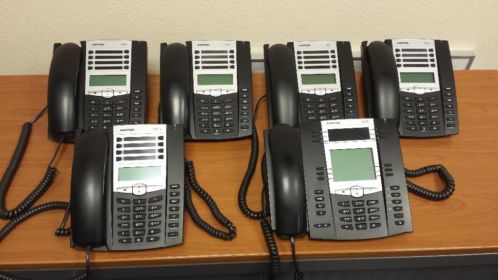 Aastra 6755i toestel en 5 Aastra 6731 i toestellen