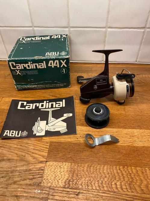 Abu cardinal 44X bruin in nieuwstaat met doos en toebehoren