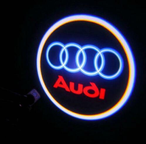 Audi logo gezocht voor in de deur met erin pluggen