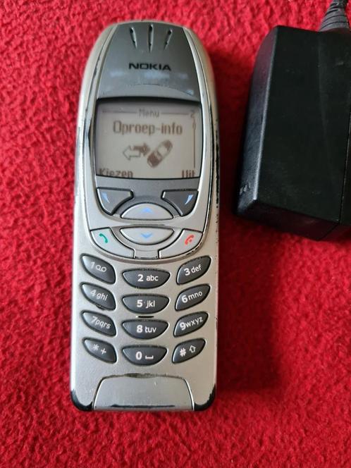 Bijna gratis 100 goed werkende Nokia 6310i,met oplader,14