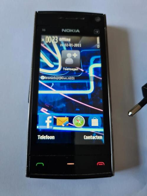 Bijna gratis Als nieuw Nokia telefoon X6,met oplader,16