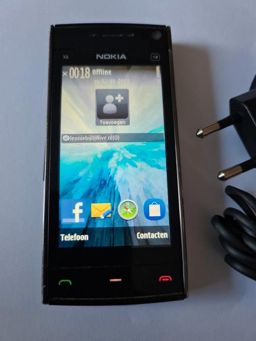 Bijna gratis Als nieuw Nokia X6 touch,met oplader, 16