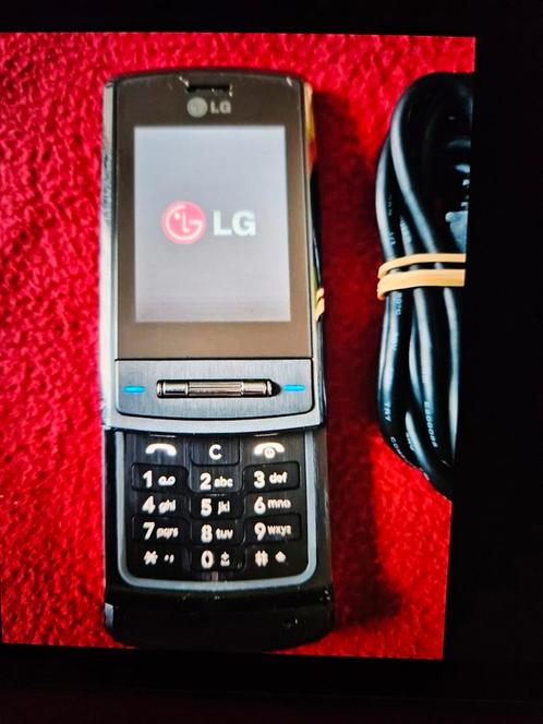 Bijna gratis goed werkende LG telefoon KE970 schuifmodel,11