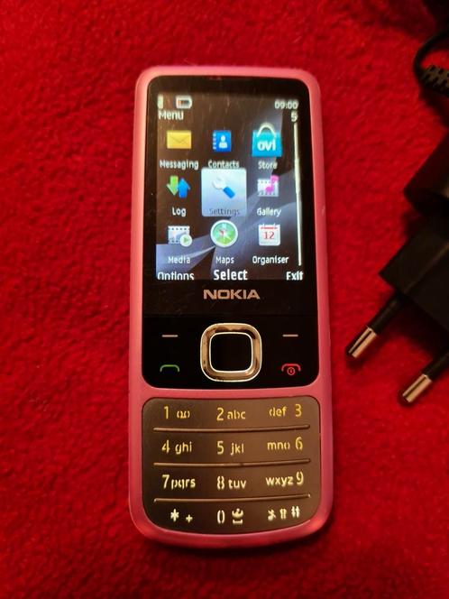 Bijna gratis goed werkende Nokia 6700c,simvrij,oplader,12