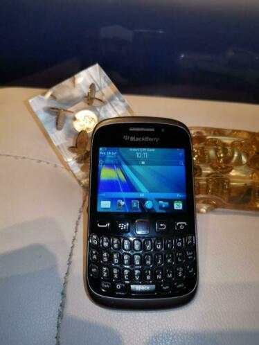 Bijna nieuw BlackBerry curve 9320 met origineel lederen hoes