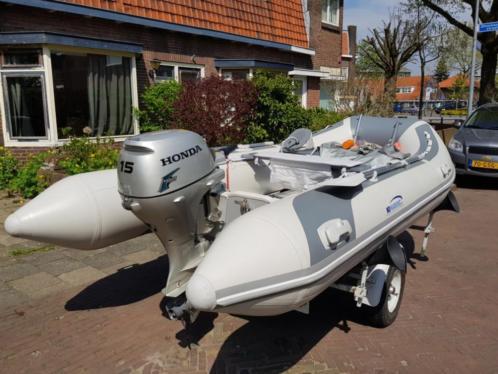 Bijna nieuwe Nimarine 390  Honda 15pk en trailer 