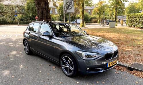 BMW 1-Serie 116i 136PK Aut. 2014 Grijs