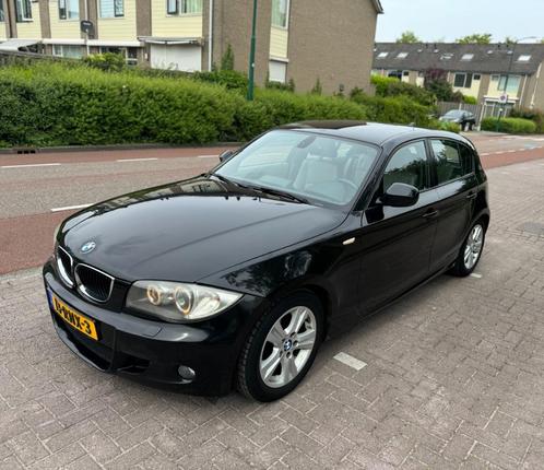 BMW 1-Serie 116i 5DR AUT 2011 Zwart - Business Line Ultimate