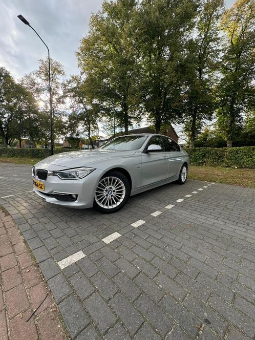 BMW 3-Serie 318d High Executive  143pk Aut 2012 Grijs