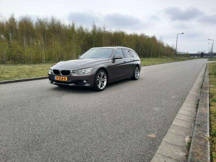 BMW 3-Serie (F31) 2.0 320I Touring AUT 2013 Bruin