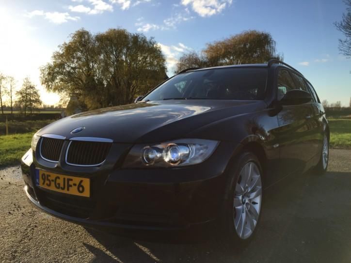 BMW 3 Serie Touring 318i Business Exexutive Navi Leer