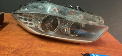 Bmw 5 serie koplamp links vochtschade
