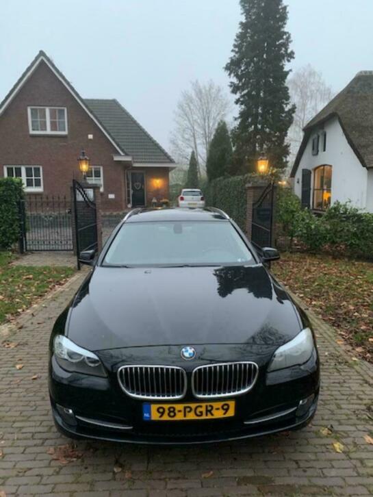 BMW 5-Serie Touring 520D High Executive Leer Navigatie Xenon