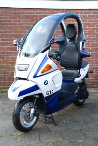 BMW C1 uitgevoerd in Williams kleurenbestickering i.z.g.st.