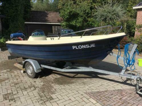 Boot met 9,9 mercury motor en trailer family 420