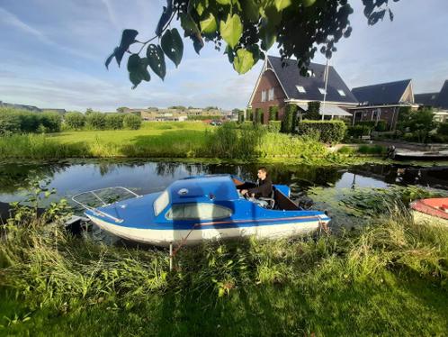 Boot met motor en trailer  ,vernieuwdquot