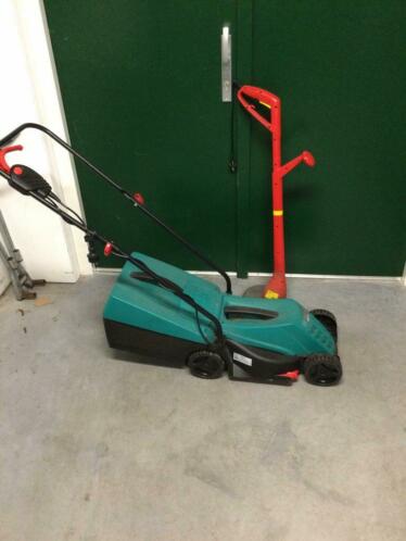 Bosch arm 3200 Grasmaaier en Wolf Garten Grastrimmer