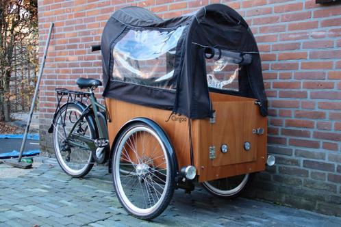 Cangoo electrische bakfiets met regenhoes en regenkap