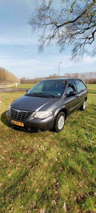 Chrysler Voyager 2.4i SE Luxe 6 persoons Climate