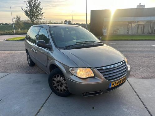 Chrysler Voyager 2.4i SE Luxe - Airco - 6 Persoons -