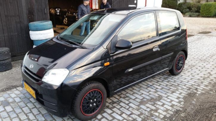 Daihatsu Cuore 1.0 12V Osaka Nw APK 119.000km zwart Dealer 