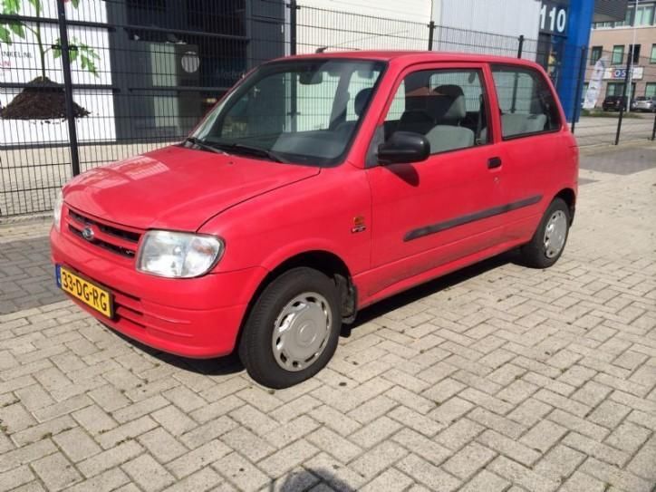 Daihatsu Cuore 1.0-12V STi 121DKM APK 9-2015  (bj 1999)