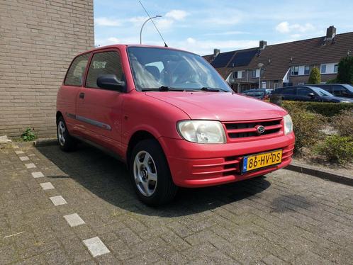 Daihatsu Cuore 1.0 40KW 2001 Rood