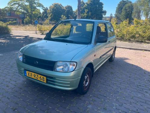 Daihatsu Cuore 1.0 AUTOMAAT bluetooth, nwe distrubitie riem