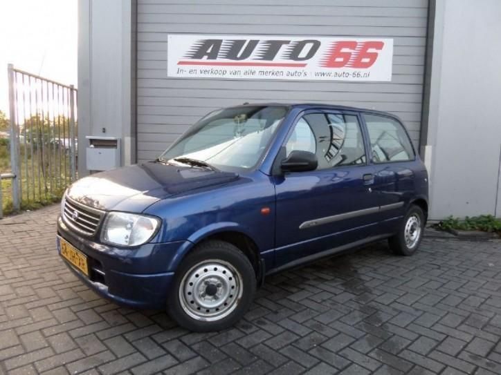 Daihatsu Cuore 1.0i-12V DVVT STi. (bj 2002)