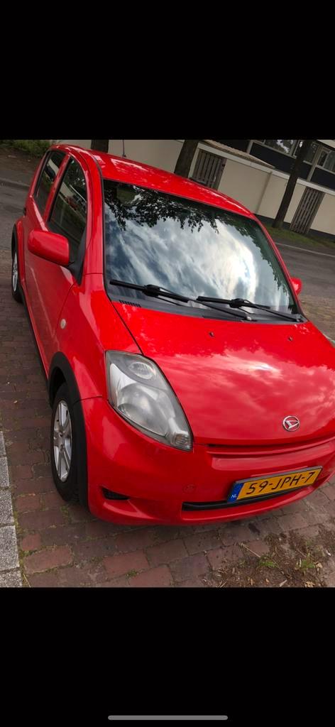 Daihatsu Sirion 2 1.0 2009 Rood Airco