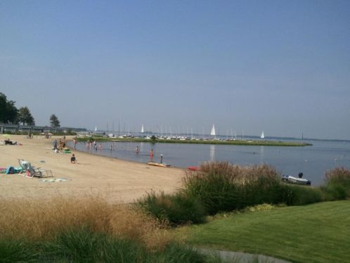 Direct aan het water, Chalet met e.v Sloep te koop