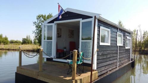 Drijvend vakantiehuisje  verblijf  blokhutboot