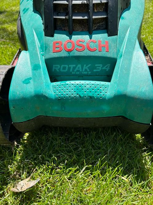 Elektrische grasmaaier Bosch en grastrimmer van Wolf