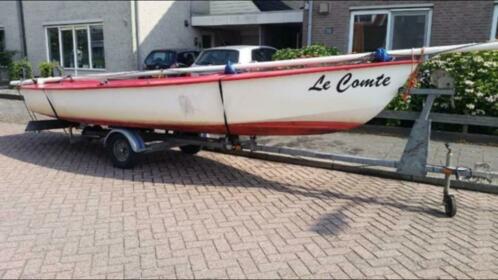 Flying Arrow spanker open zeilboot met 4 tact bbm