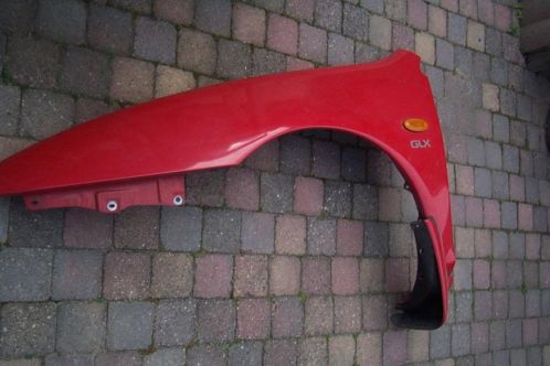 goed spatbord (bestuurderskant) mazda 323f BA 19941999