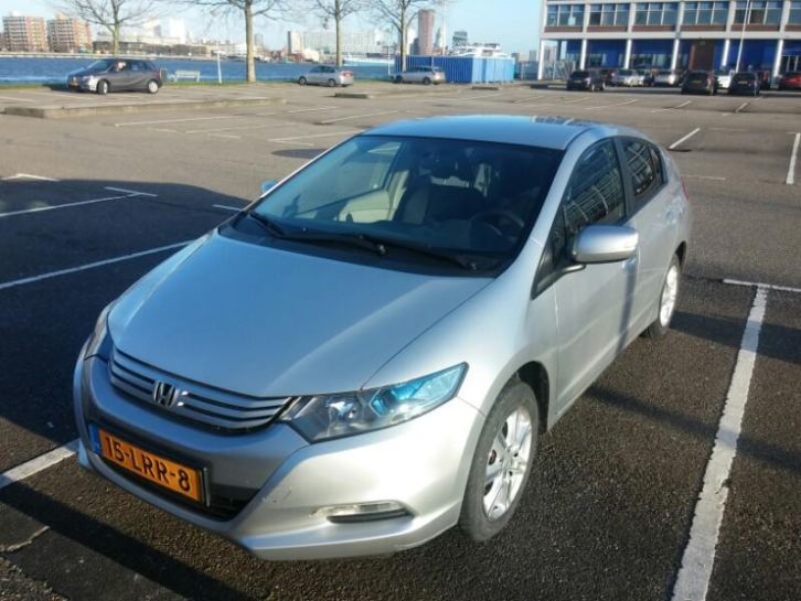 Honda Insight 1.3 bj2010 zgan winterbanden en zomerbanden