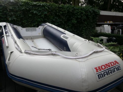 Honwave T32 (2006) Honda 15 pk viertakt (2004)  trailer