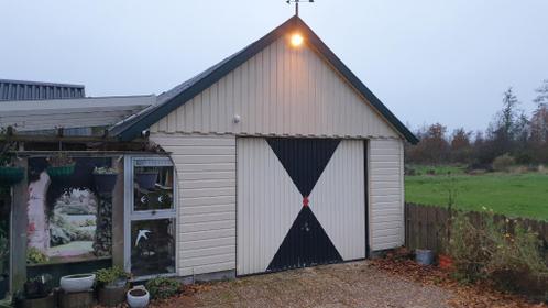 houten garage met geisoleerd werkhok en zolder