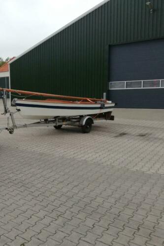 Houten schakel zeilboot