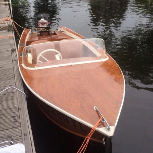 Houten speedboot met 35 pk buitenboordmotor 