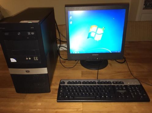 HP computer met beeldscherm, toetsenbord en muis