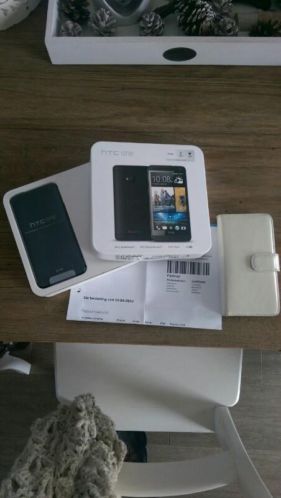 HTC m7 met factuur.