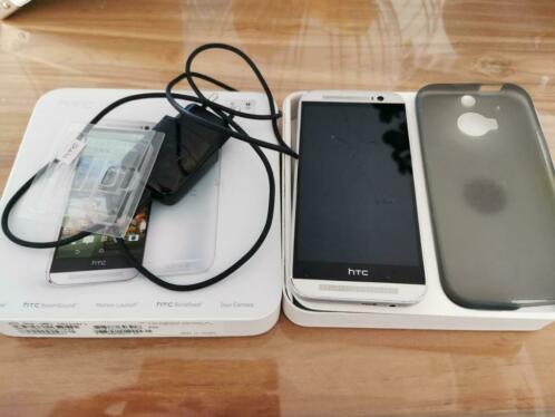Htc One M8 met bon en lader hoes heeft wel krassen