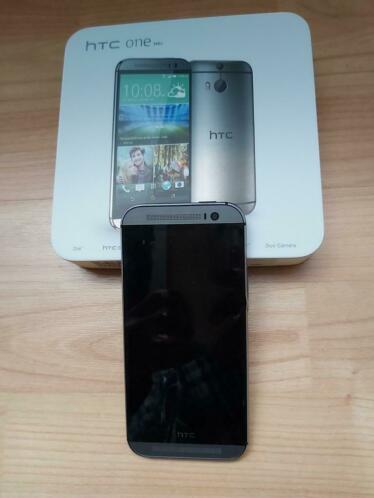HTC one m8s compleet met doos,oplader en nieuwe oordopjes