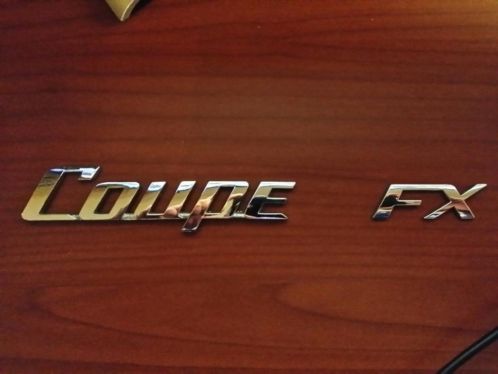 Hyundai coupe embleem en fx logo
